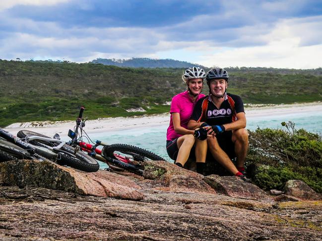 Travis and Jane Deane, authors of the Tasmanian Mountain Bike Guide Book. (supplied pic)