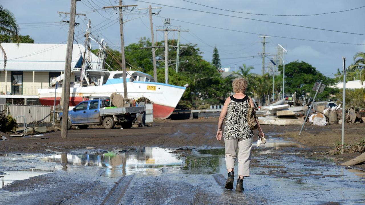 News 1.2.2013, Courier Mail Bundaberg, A trawler sits high &amp; dry in Quay st Bundaberg after the flood. Photo Paul Beutel