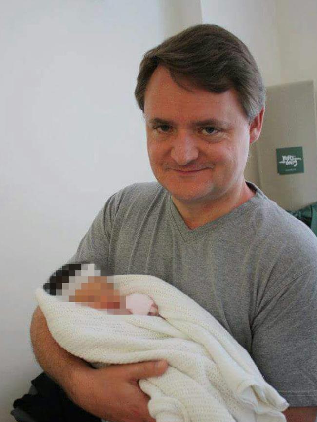 Fernando Manrique holding his newborn child. Picture: Supplied.