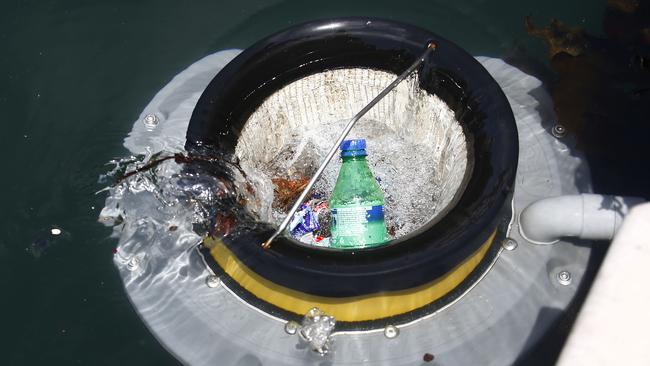 One of the seabins in action as it sucks in the surrounding waterborne rubbish. Picture: John Appleyard