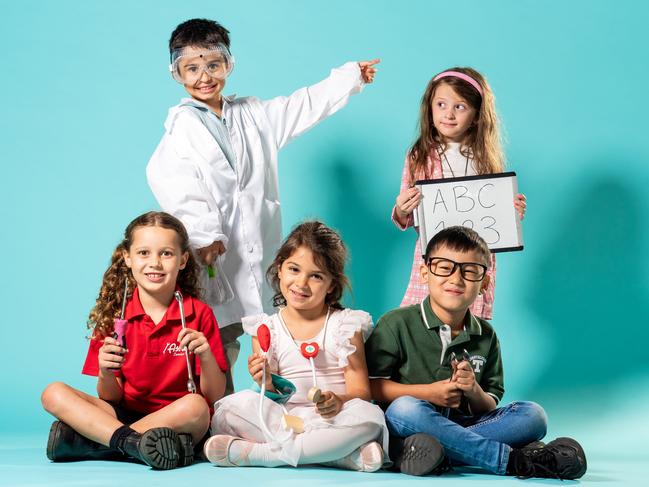 Kindergarten students Chloe, Luca, Annabelle, Jonathan, and Aaliyah are excited about starting school. When they grow up, they want to become a mechanic, scientist, ballerina/doctor, engineer and teacher respectively. Picture: Tom Parrish