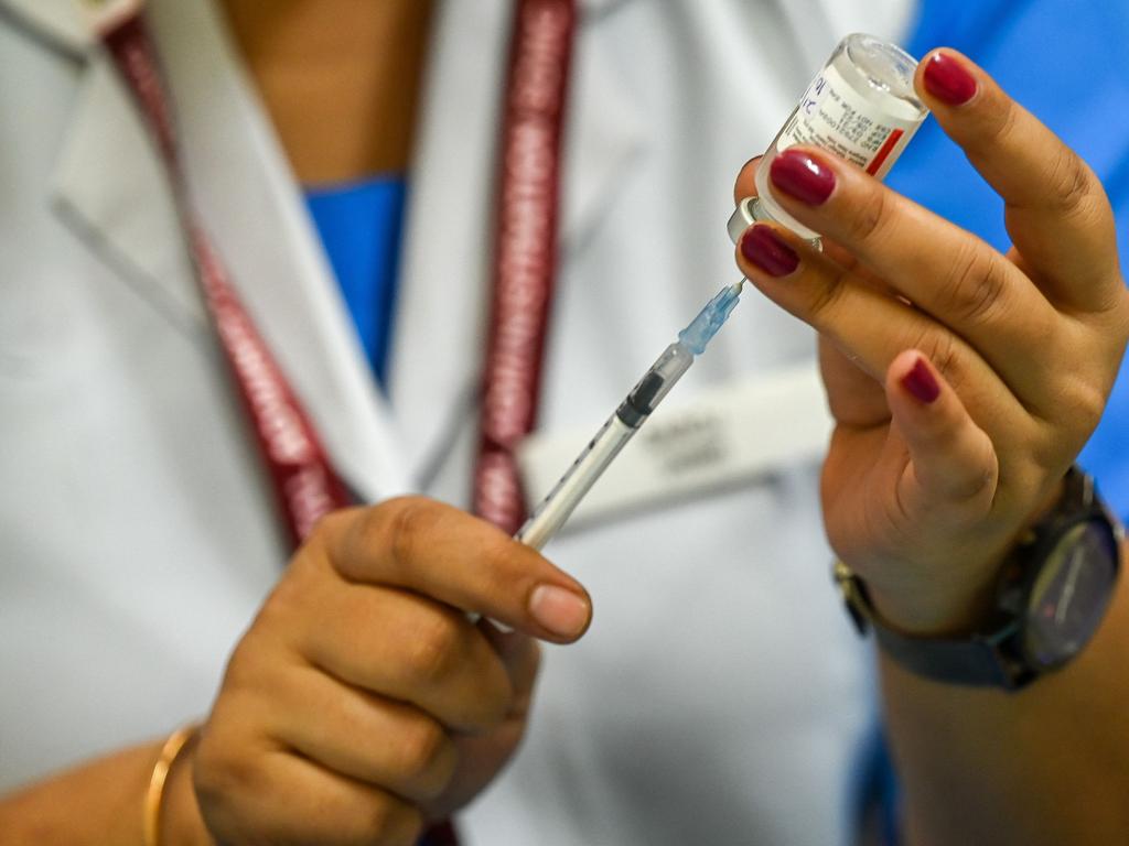 Travellers entering Australia who are aged 12 and over and have been vaccinated with Covaxin will be recognised as fully vaccinated by ATAGI. Picture: Prakash SINGH / AFP