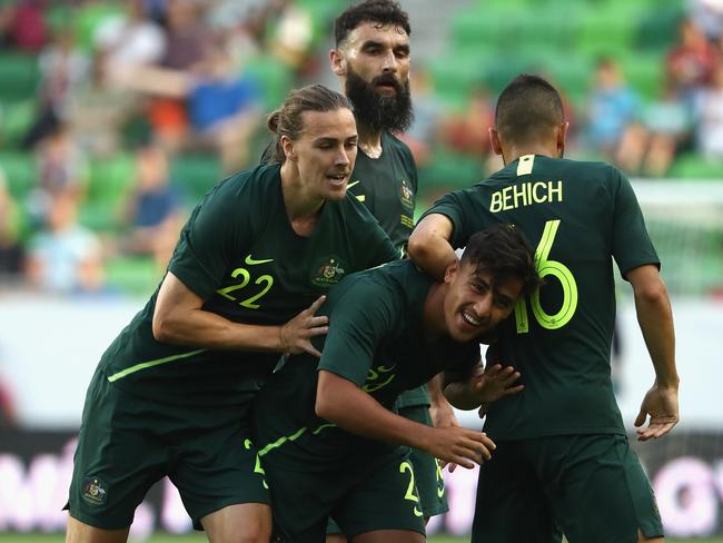 Daniel Arzani of Australia celebrates after scoring a goal - his first international