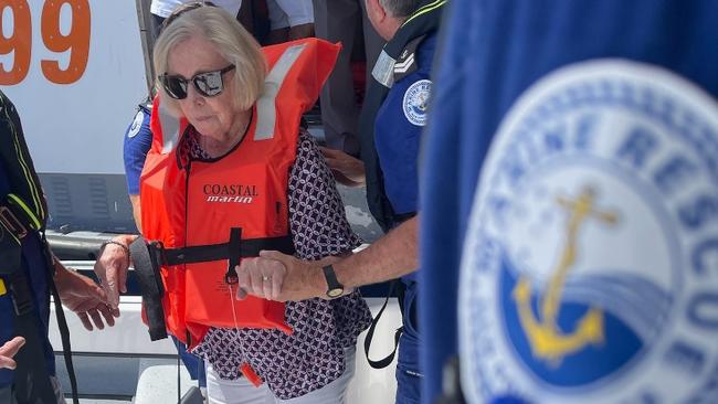 Passengers being rescued from a cruise boat taking on water in the Hastings River at Port Macquarie.