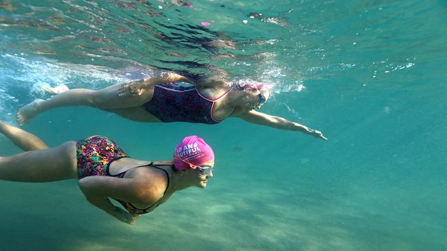 Manly Bold and The Beautiful swimmers Jennifer Turner (closest) and Jessica Middleton going for a 7am swim. Picture: Stephen Cooper