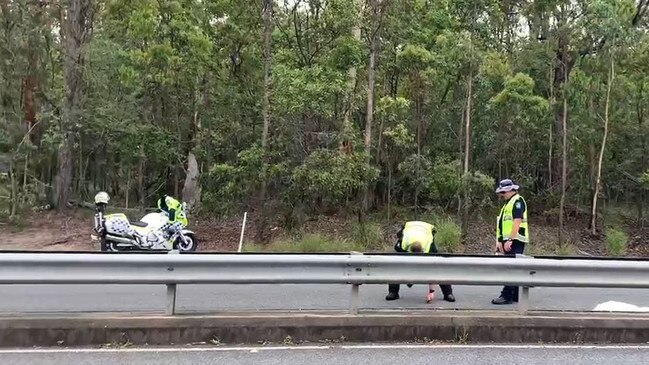 Police at the scene of the alleged hit-and-run of an officer by a stolen car. Picture: Danielle Buckley