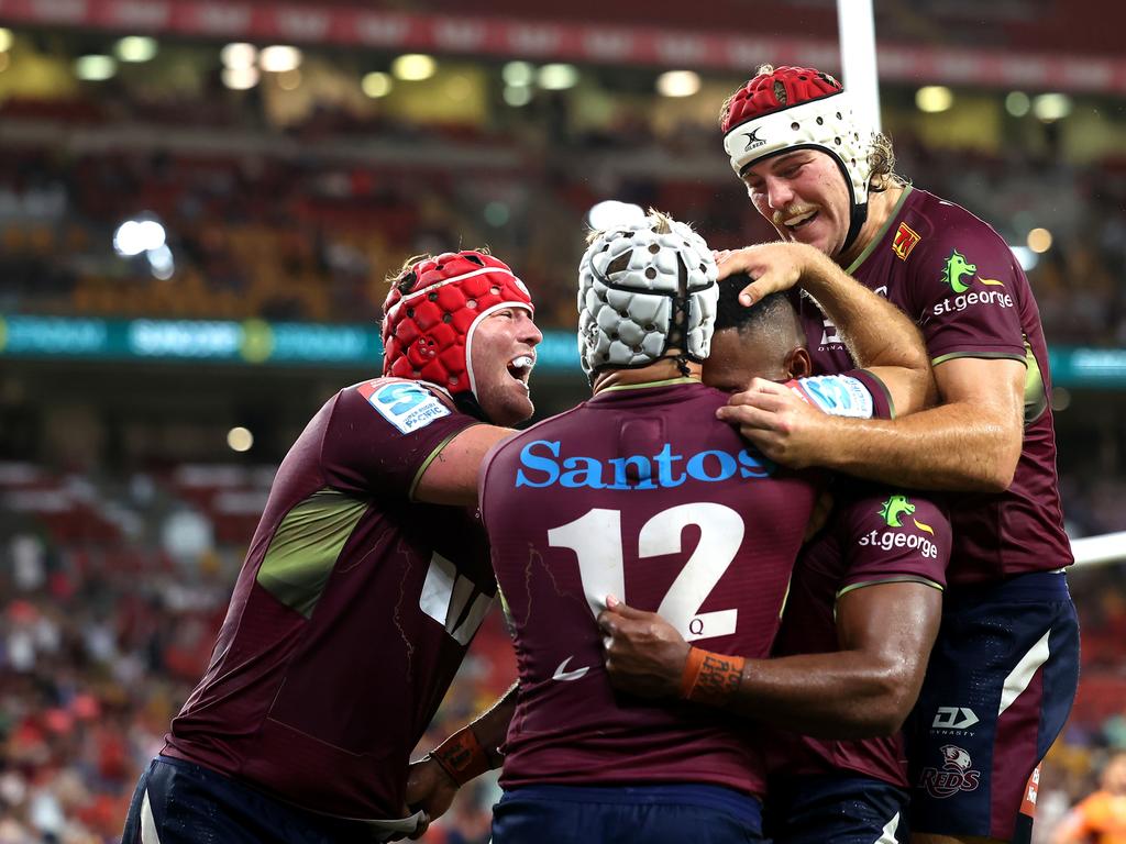 The Reds celebrate Filipo Daugunu’s try in their win over the Brumbies. Picture: Albert Perez/Getty Images