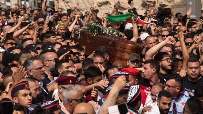 Family and relatives attend the funeral of Al Jaseera reporter Shireen Abu Akleh on Friday. Picture: Getty Images