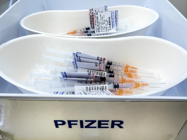 MELBOURNE, AUSTRALIA - NewsWire Photos NOVEMBER 5, 2021: Prepared doses of Pfizer vaccine at the vaccination Hub at the Melbourne Showgrounds as Australia is expected to pass the 80 percent  double vaxxed rate today. Picture: NCA NewsWire / David Geraghty