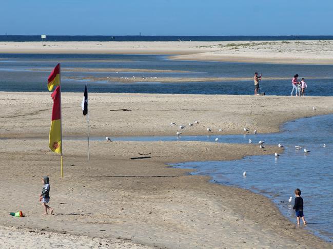 The sand spit at Happy Valley and Bulcock Beach.