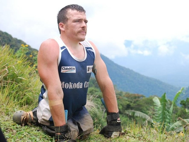 Paralympian Kurt Fearnley crawling the Kokoda Track.