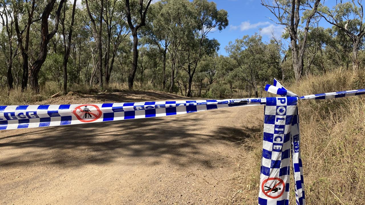 Picture of police tape sealing off Shannonvale Rd about 3km from crime scene where Mervyn and Maree Schwarz and Graham Tighe were shot and killed at Bogie, Central Queensland.