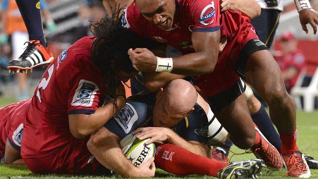 Stephen Moore of the Brumbies scores a try.