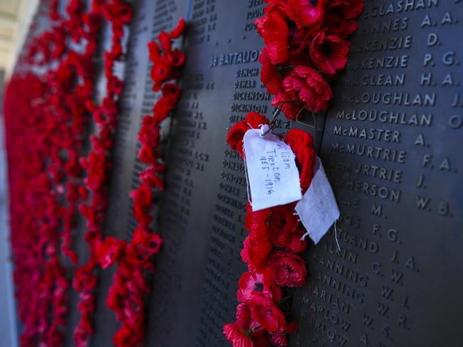 Poppies are seen at the Roll of Honour at the Australian War Memorial in Canberra. Picture: Lukas Coch