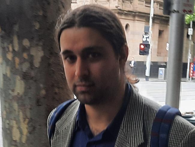 Nicholas Harvey Raymond, 31, arrives at the Melbourne Magistrates' Court on Monday (28 Nov 22) where he is charged with possessing more than $8 million in bitcoin suspected of being the proceeds of online drug dealing. , Picture: Craig Dunlop