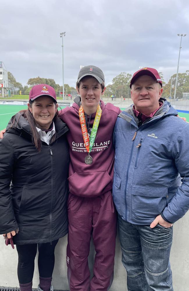 16-year-old Sam Riggs with Mum Catherine and Dad Terry after claiming a medal at this year’s School Sport Australia Hockey Championships in Hobart, Tasmania