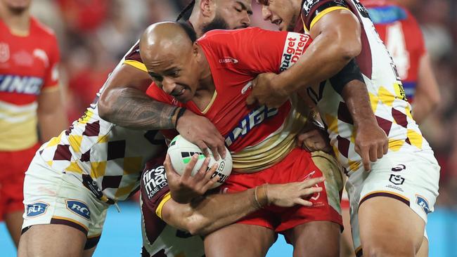 BRISBANE, AUSTRALIA - AUGUST 31: Felise Kaufusi of the Dolphins is tackled during the round 26 NRL match between Dolphins and Brisbane Broncos at Suncorp Stadium, on August 31, 2024, in Brisbane, Australia. (Photo by Mackenzie Sweetnam/Getty Images)