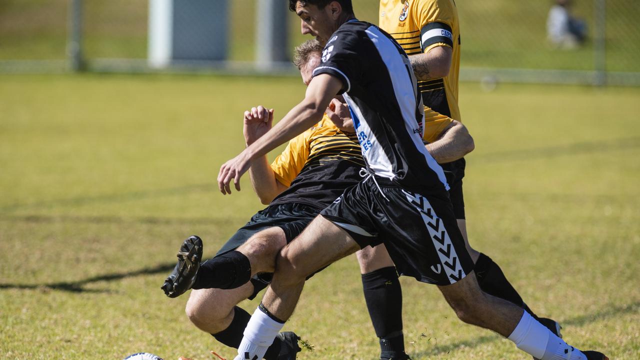 Sam Robertson (left) of Dalby Tigers and Barazan Khudedah of Willowburn in Div 2 Men FQ Darling Downs Presidents Cup football at West Wanderers, Sunday, July 24, 2022. Picture: Kevin Farmer