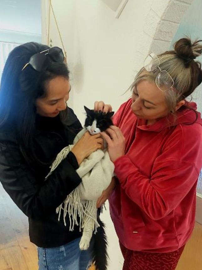 Titi with owner Emily and rescuer Chantal. Picture: Supplied