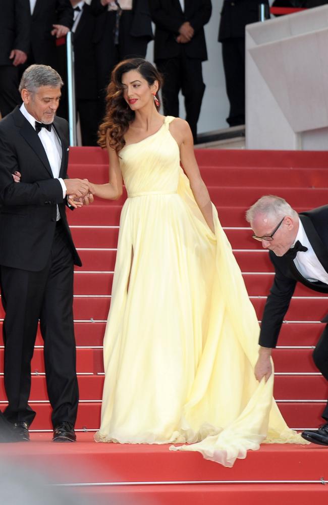 George Clooney and wife Amal Alamuddin on "Money Monster" red carpet at 69th Cannes Film Festival.