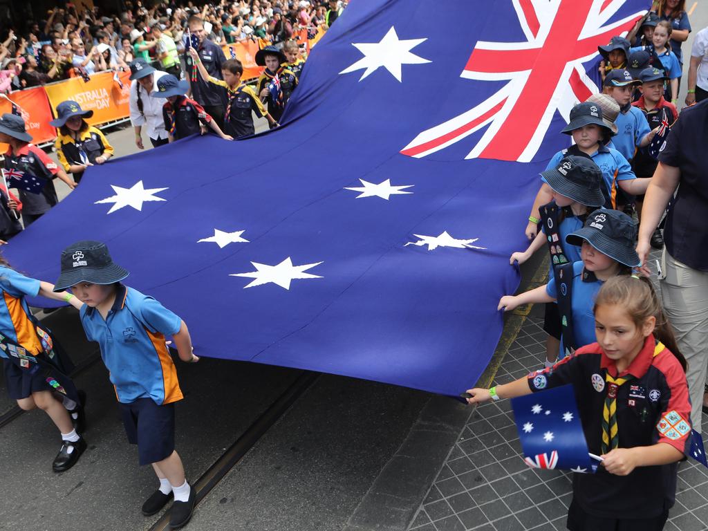 Kids take part in an Australia Day parade in Melbourne last year. Picture: David Crosling 