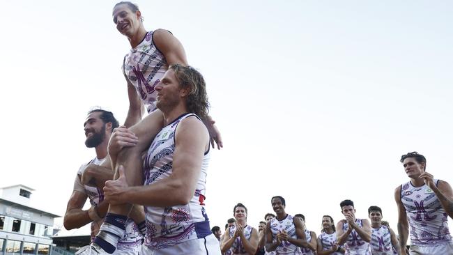 Nat Fyfe is chaired off by Alex Pearce and David Mundy after the Dockers broke an 11-game drought. Picture: AFL Photos/via Getty Images