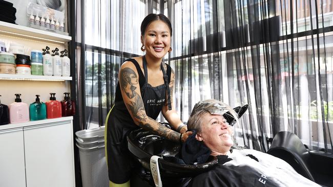 Salon Manager Winter Ham with client Kayleen Morgan at Epic Hair in Fortitude Valley. Pics Tara Croser.