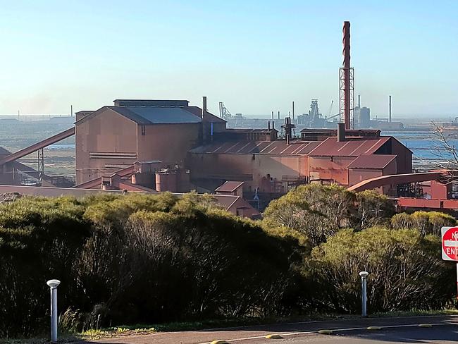 This handout photo taken by Nicholas Williams-Chamarro on August 26, 2023 shows the Whyalla steelworks in Whyalla, South Australia. The failing Australian major steel plant at Whyalla, owned by British billionaire Sanjeev Gupta's company GFG Alliance, will be transformed into a hub for making "green iron and steel", Prime Minister Anthony Albanese said Thursday as the government stepped in with a billion-dollar rescue package. (Photo by Nicholas Williams-Chamarro / AFP) / RESTRICTED TO EDITORIAL USE - MANDATORY CREDIT "AFP PHOTO / NICHOLAS WILLIAMS-CHAMARRO" - NO MARKETING NO ADVERTISING CAMPAIGNS - DISTRIBUTED AS A SERVICE TO CLIENTS