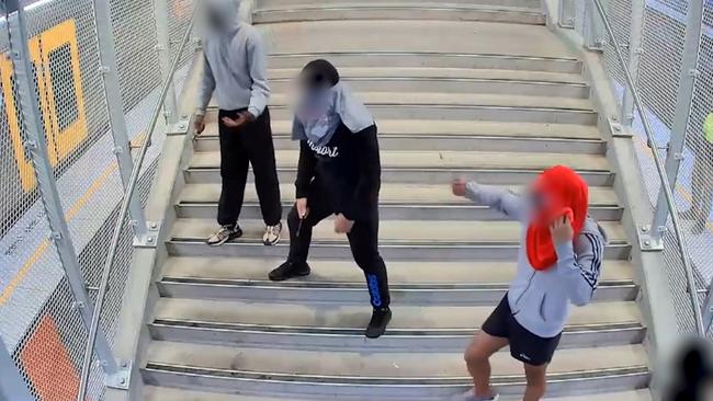 OneFour and Inner West gang members brawl in front of shocked commuters at Rooty Hill station. Picture: NSW Police