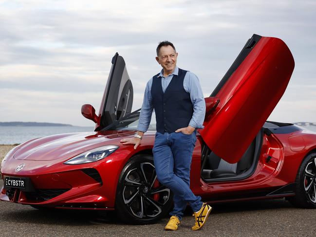 WEEKEND TELEGRAPH 25TH JULY 2024Pictured at Ramsgate in Sydney is lifelong convertible fan Ecrole Giardullo with his old BMW and his new MG Cyberster convertible, Australia's first electric sports car. Ecrole is trading in his BMW for the wild new MG convertible whilst embracing the move towards electric cars.Picture: Richard Dobson