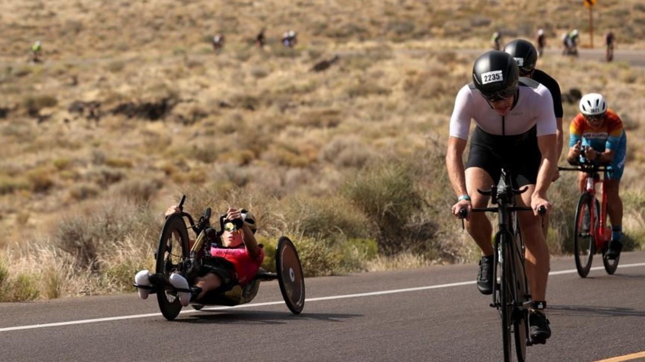 Newcastle triathlete Lauren Parker on her hand cycle in the 90km cycle leg.