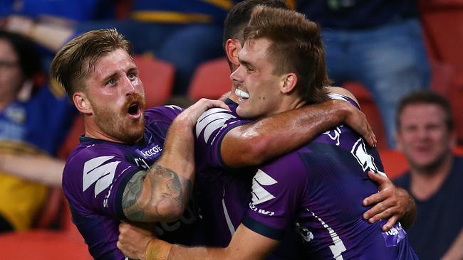 Cameron Munster and Ryan Papenhuyzen of the Storm. Photo: Jono Searle/Getty Images