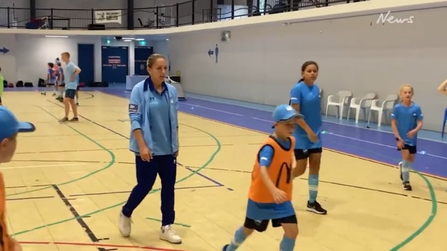 Matildas midfielder Mackenzie Hawkesby joins in Sydney FC junior holiday clinic