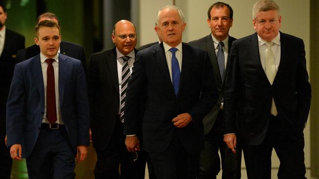 Malcolm Turnbull, centre, arrives for the Liberal party room leadership spill in September 2015 surrounded by his backers.