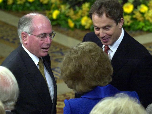 JULY 6, 2000 : Australian Prime Minister John Howard (L) & British PM Tony Blair during a reception in the Royal Gallery in the House of Lords in Westminster, Howard in England to celebrate Centenary of Federation, 06/07/00. Pic Michael Jones.