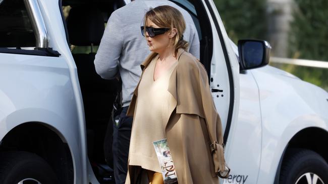 Celebrity stylist Kelly Smythe leaving her home in Point Piper on Tuesday. She has been accused of providing fake medical scripts for drugs. Picture: Jonathan Ng