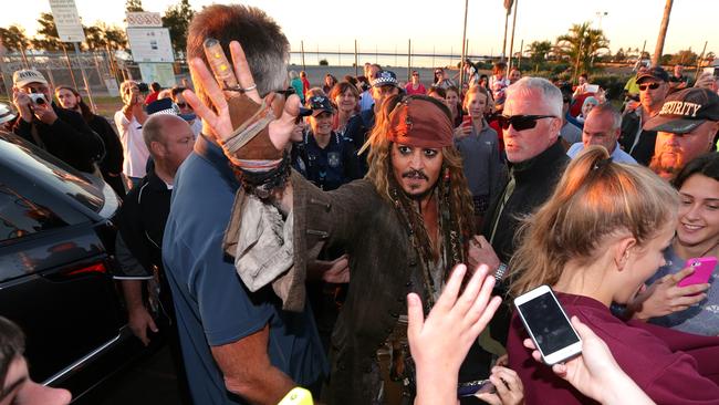 Johnny Depp meets fans in Queensland after a day filming Pirates of the Caribbean. Picture: Peter Wallis