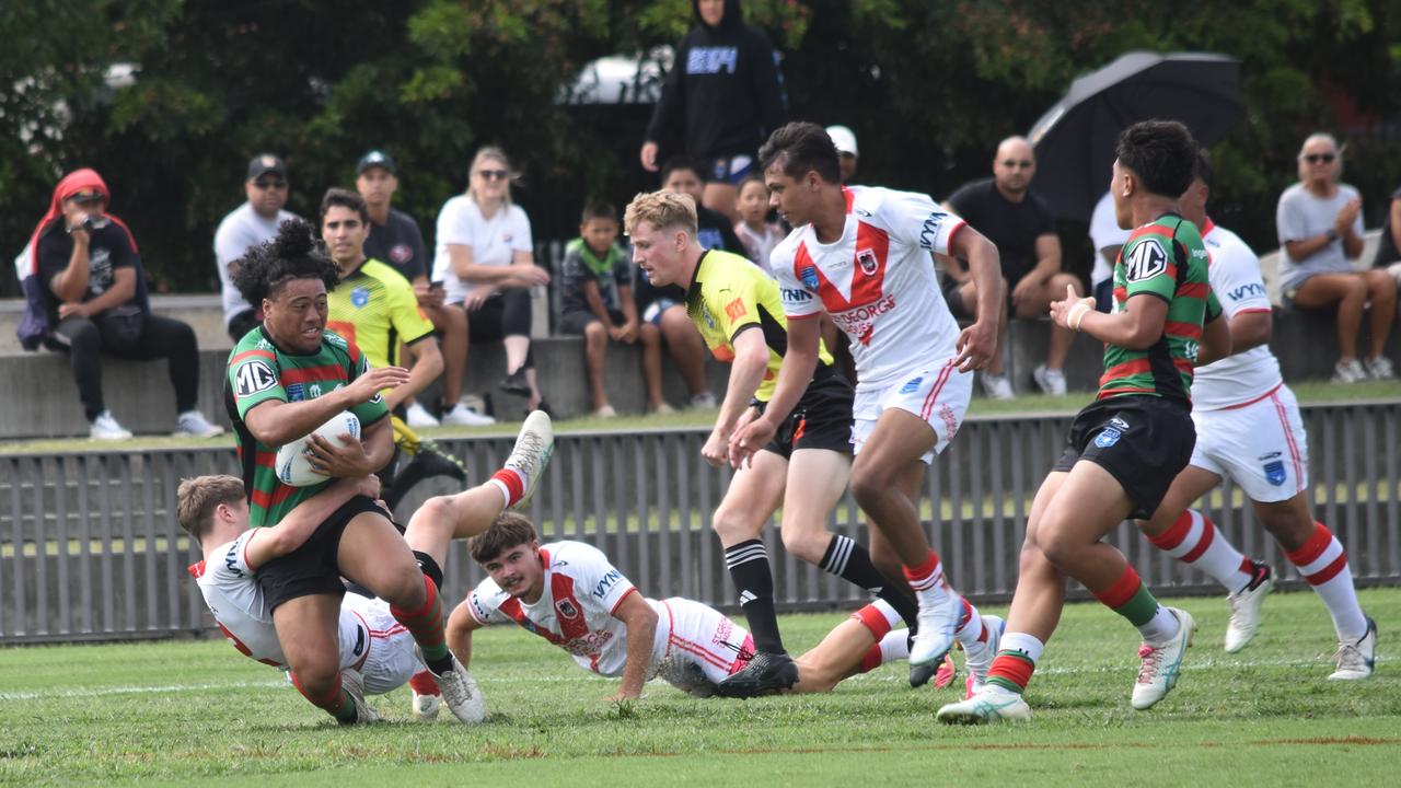 Jahzelle Lokeni is tackled by Jack Lambert. Picture: Sean Teuma