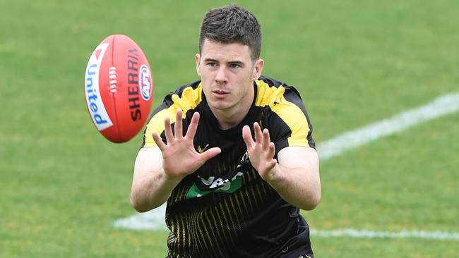 Damian Hardwick has revealed Jack Higgins is unlikely to be unveiled for Richmond early in the season. Picture: AAP Image/Mal Fairclough