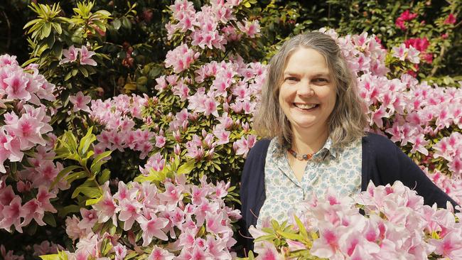 Air quality expert Dr Fay Johnston, from the Menzies Institute for Medical Research, among the azaleas at the Royal Tasmanian Botanical Gardens. Picture: MATHEW FARRELL