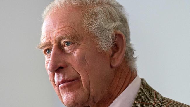 Britain's King Charles III reacts during his visit to the Global Underwater Hub in Westhill, eastern Scotland, September 29, 2023, where he met staff and learnt about their educational outreach programmes. (Photo by Jane Barlow / POOL / AFP)