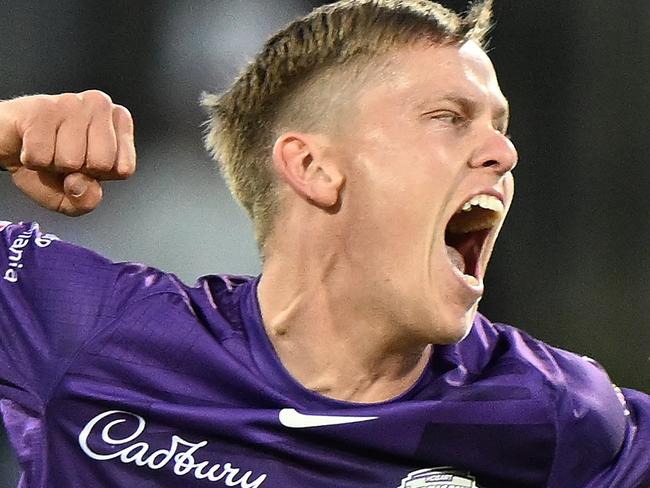 HOBART, AUSTRALIA - JANUARY 23: Nathan Ellis of the Hurricanes celebrates the wicket of Steve Smith of the Sixers during the Men's Big Bash League match between the Hobart Hurricanes and the Sydney Sixers at Blundstone Arena, on January 23, 2023, in Hobart, Australia. (Photo by Steve Bell/Getty Images)