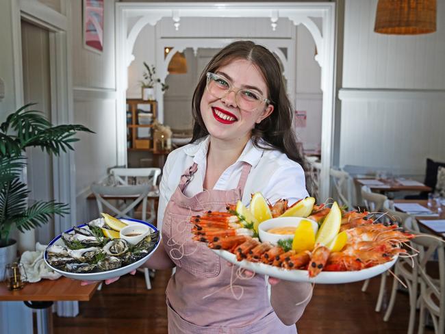 Restaurant supervisor at restaurant, One Fish Two Fish in Kangaroo Point, Alia Crocker with seafood customers can enjoy on Christmas Day. Picture: Zak Simmonds