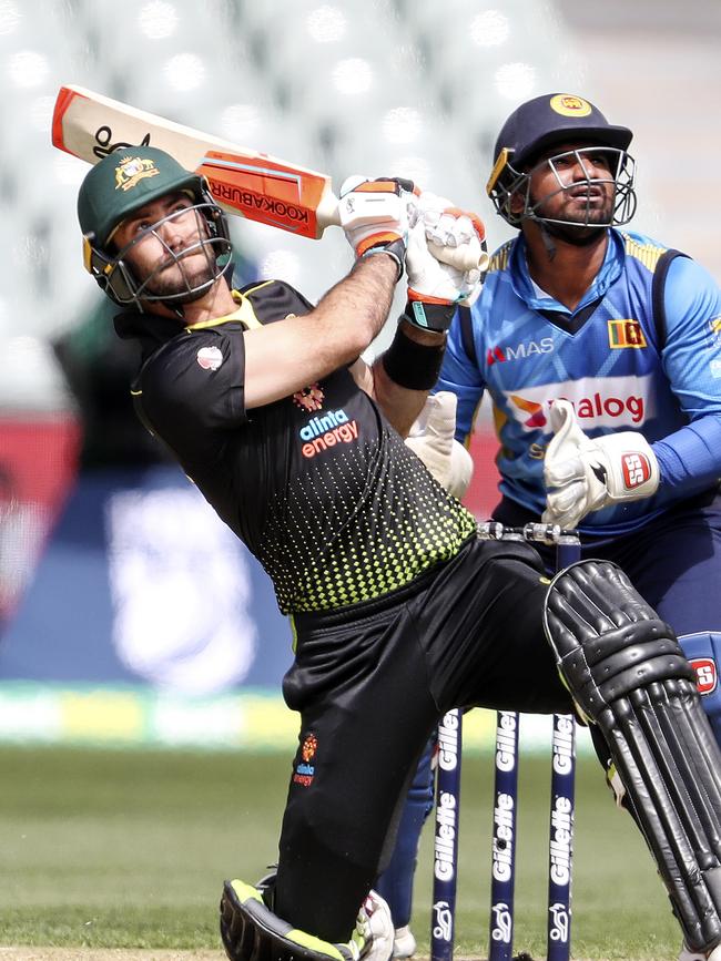 Glenn Maxwell launches a massive six in a T20 against Sri Lanka.