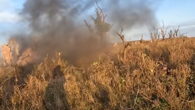 A drone strikes just five metres ahead of them trying to get back to the bunker house. Picture: Youtube