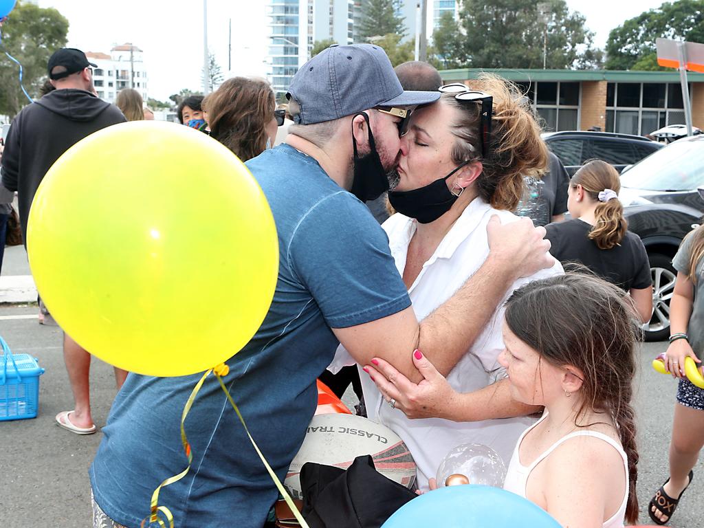 Families reunite, with balloons. Picture: Richard Gosling