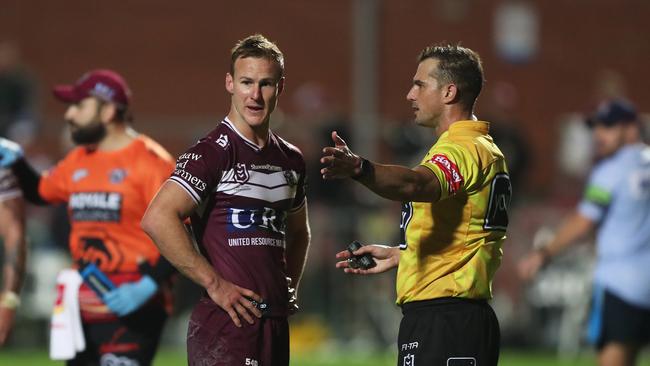 Strike three: Captain Daly Cherry-Evans remonstrates with referee Grant Atkins at full time after the video referee incorrectly denied Manly a late penalty. Picture: Brett Costello