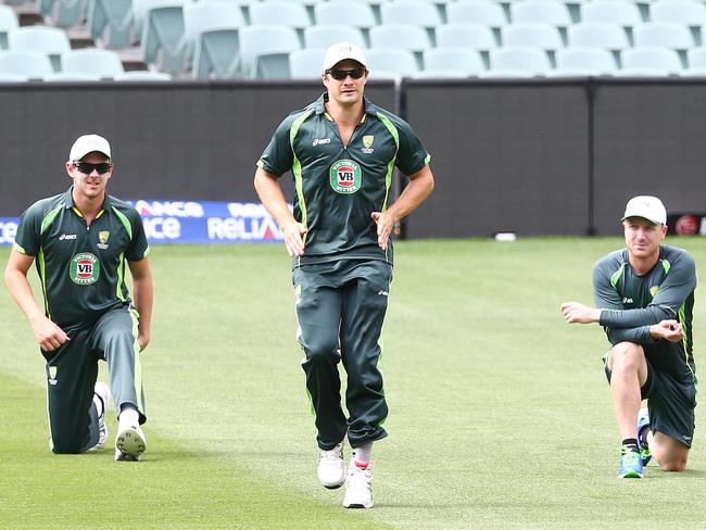 Shane Watson (centre) jogs at Australia training in Adelaide. Picture: Sarah Reed