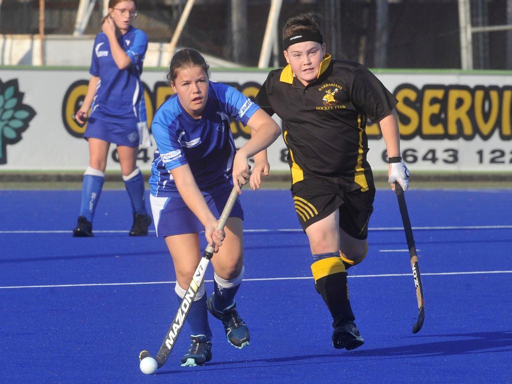 GIVING CHASE: Reece Winters of Barbs Kookaburras (right) chases Sailors Grafton Air's Laura Hennesey in the 2019 under-16 GHA grand final.