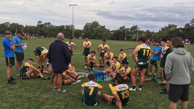 Alexandra Hills reserves listen to coach Shaun McRae.